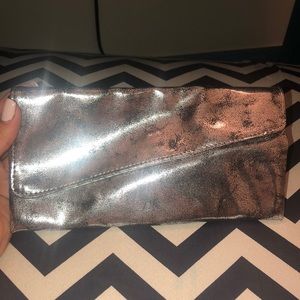 New silver clutch